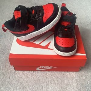 Red and black Nike